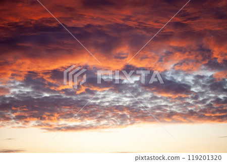 A sunset with a purple sky and clouds A sunset with a purple sky and clouds 119201320