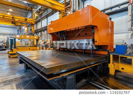 Large Industrial Hydraulic Press in Operation. Ideal for demonstrating heavy machinery in manufacturing settings 119202767