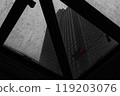 Buildings and red lights seen through windows 119203076