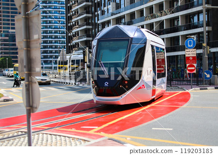 Dubai, United Arab Emirates - October 1, 2024 Dubai public transport tram on the street of the city. Editorial 119203183