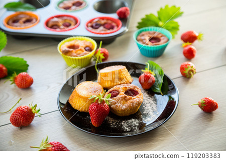 Sweet curd muffins with strawberry filling Sweet curd muffins with strawberry filling 119203383