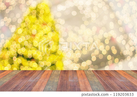 Empty wood table top with blur Christmas tree with bokeh light background 119203633