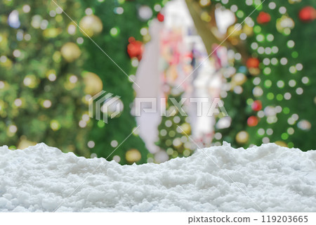 Empty white snow with blur Christmas tree with bokeh light background 119203665