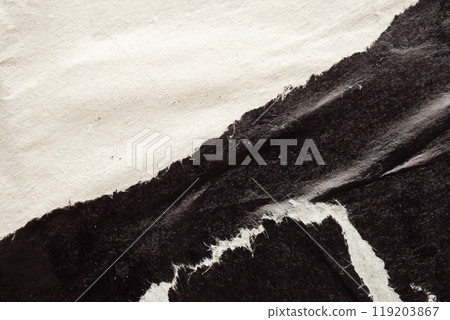 Old grunge ripped torn black paper poster surface texture background 119203867