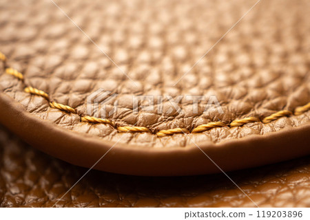 luxury brown leather bag texture background with stitching 119203896