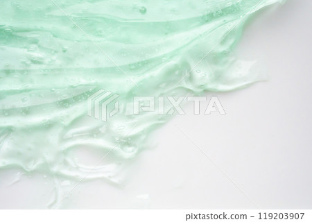 Transparent clear green liquid serum gel cosmetic texture background Transparent clear green liquid serum gel cosmetic texture background 119203907