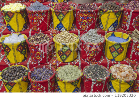colorful baskets full of spices in a Middle Eastern souk 119205320