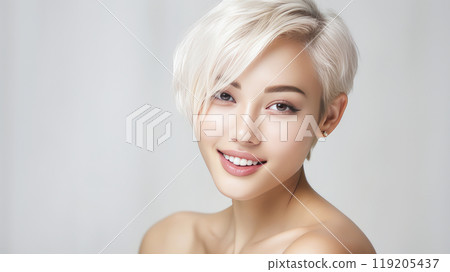 Portrait of a beautiful, sexy, smiling, happy Asian blonde woman with short haircut and perfect skin, silver background, banner. Portrait of a beautiful, sexy, smiling, happy Asian blonde woman with short haircut and perfect skin, silver background, banner. 119205437