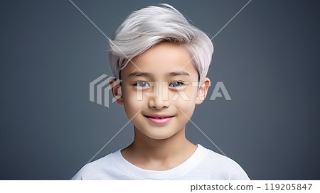 Portrait of a cute handsome happy Asian boy child blond with white hair and perfect skin, gray background, banner. 119205847