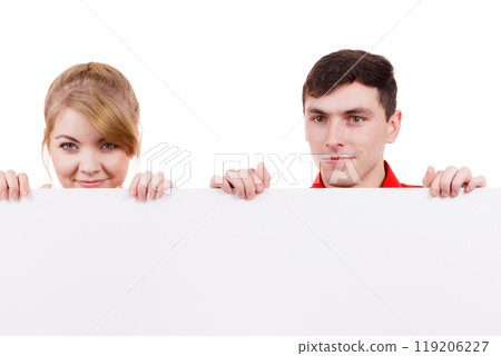 Couple with blank presentation board banner sign Couple with blank presentation board banner sign 119206227