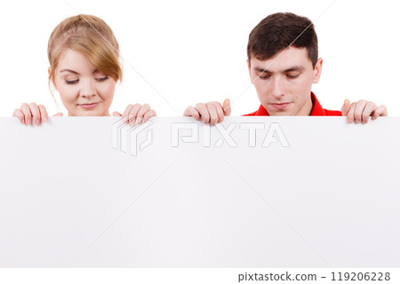 Couple with blank presentation board banner sign Couple with blank presentation board banner sign 119206228
