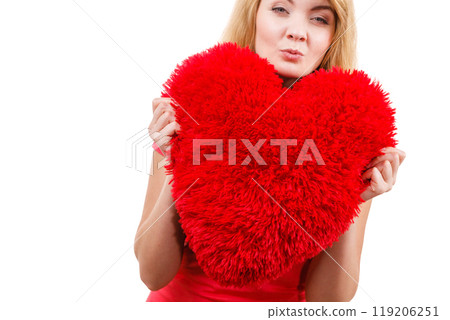 Woman blonde girl holding red heart love symbol 119206251