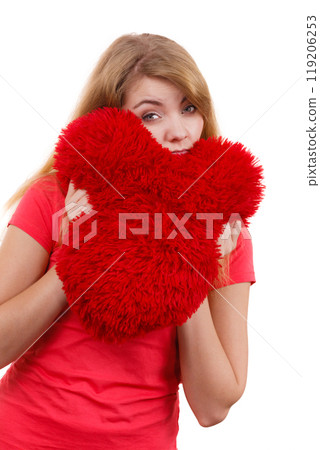 Woman sad girl hugging red heart love symbol 119206253