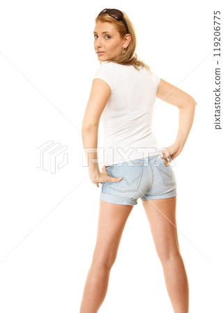 Summer fashion. Pretty sexy girl in denim shorts 119206775