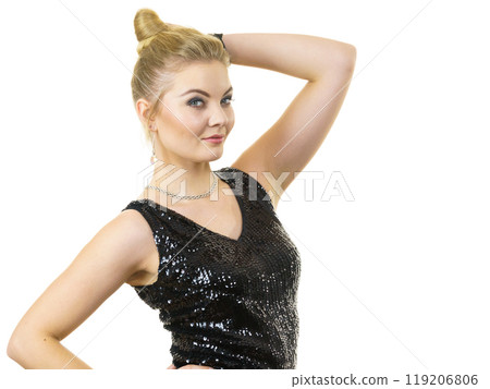 Party girl wearing dress with sequins Party girl wearing dress with sequins 119206806