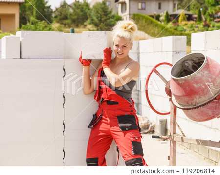 Woman working with airbricks Woman working with airbricks 119206814