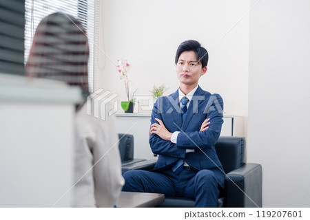 A salesman who becomes arrogant after negotiations break down A salesman who becomes arrogant after negotiations break down 119207601