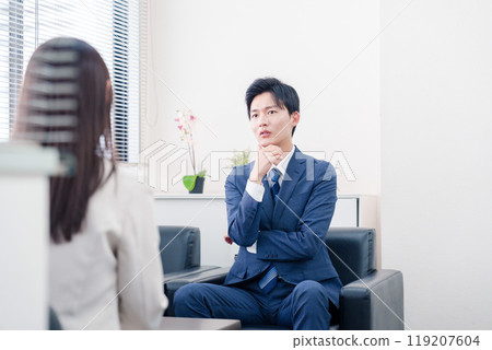 A salesman who becomes arrogant after negotiations break down A salesman who becomes arrogant after negotiations break down 119207604