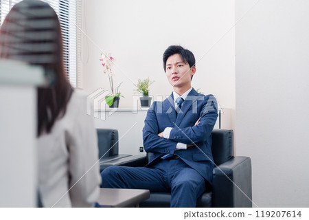 A salesman who becomes arrogant after negotiations break down A salesman who becomes arrogant after negotiations break down 119207614