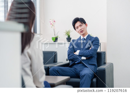 A salesman who becomes arrogant after negotiations break down A salesman who becomes arrogant after negotiations break down 119207616