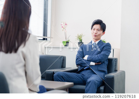 A salesman who becomes arrogant after negotiations break down A salesman who becomes arrogant after negotiations break down 119207618