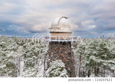 Old observatory tower in the Glen park. Tallinn, Estonia, against dramatic sky Old observatory tower in the Glen park. Tallinn, Estonia, against dramatic sky 119207621