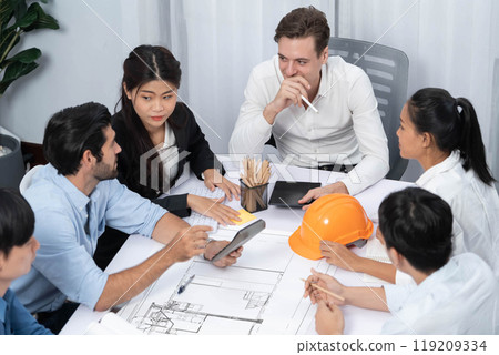 Diverse group of civil engineer and client working on architect. Prudent 119209334