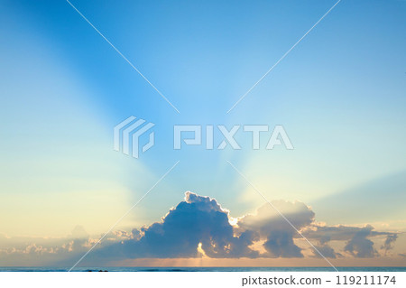 Sunrise from behind the clouds 119211174