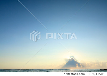 Sunrise from behind the clouds Sunrise from behind the clouds 119211505