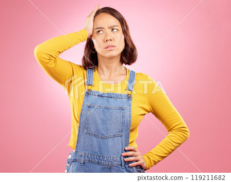 Confused, thinking and asian woman in studio with questions, problem or choice on pink background. Doubt, decision and and Japanese female with why, emoji or frustrated by news, promo or wondering Confused, thinking and asian woman in studio with questions, problem or choice on pink background. Doubt, decision and and Japanese female with why, emoji or frustrated by news, promo or wondering 119211682