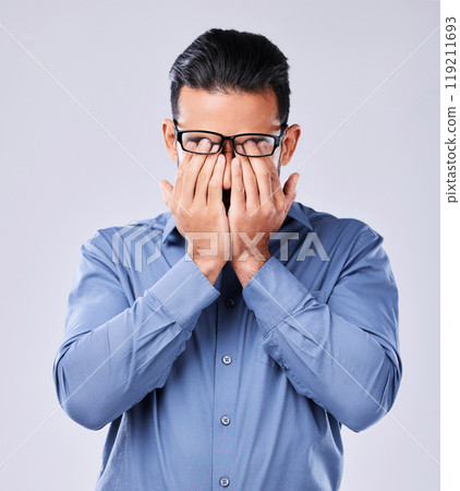 Stress, headache and man with glasses in studio for vertigo, eye strain or blurry vision on white background. Anxiety, optometry and male with migraine, brain fog or burnout with mental health crisis 119211693