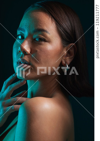 Body care, cosmetic and portrait of woman in a studio with a natural, health and moisturizing treatment. Beauty, self care and Asian female model with a soft glowing skin by a dark black background. 119211777