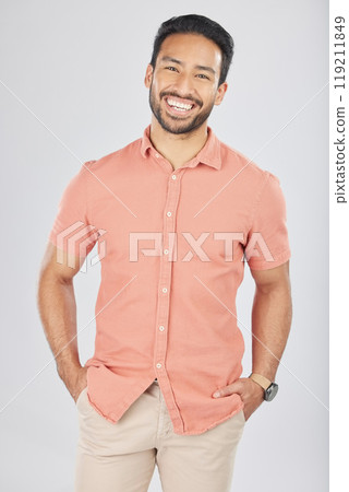 Happy, fashion and portrait of business Asian man in studio for confidence, pride and smile. Confident, casual worker and isolated person in style, trendy clothes and outfit on white background 119211849