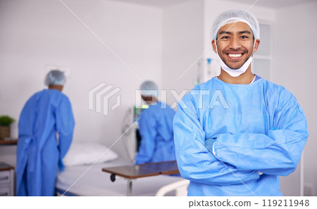 Happy asian man, doctor and arms crossed of professional in ICU with medical team for healthcare service at hospital. Portrait of male person, surgeon or nurse smile in confidence or health at clinic Happy asian man, doctor and arms crossed of professional in ICU with medical team for healthcare service at hospital. Portrait of male person, surgeon or nurse smile in confidence or health at clinic 119211948