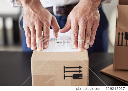 Label, delivery or hands of man with box for courier cargo, ecommerce or supply chain distribution service. Shipping, order sticker or postman sending a store package, freight parcel or mail product Label, delivery or hands of man with box for courier cargo, ecommerce or supply chain distribution service. Shipping, order sticker or postman sending a store package, freight parcel or mail product 119212037