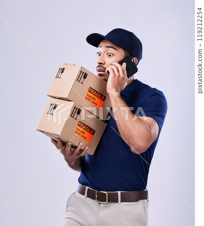 Phone call, shipping box and delivery man stress, conversation or studio discussion about late export. Courier distribution crisis, fail and person talk on cellphone communication on white background Phone call, shipping box and delivery man stress, conversation or studio discussion about late export. Courier distribution crisis, fail and person talk on cellphone communication on white background 119212254