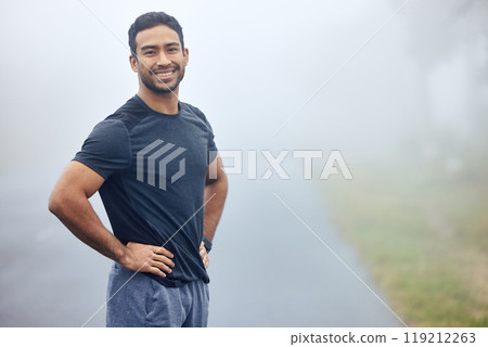 Portrait, fog and man outdoor for exercise with runner in nature for cardio, health and wellness. Fitness, workout and run on a misty morning in park, training for marathon or race with confidence 119212263