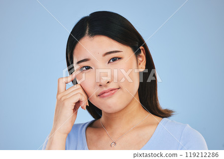 Portrait, thinking and Asian woman with ideas, solution and problem solving on a blue studio background. Face, Japanese person and model with a question, emoji and mockup space with brainstorming Portrait, thinking and Asian woman with ideas, solution and problem solving on a blue studio background. Face, Japanese person and model with a question, emoji and mockup space with brainstorming 119212286