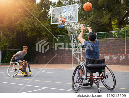 Sports, basketball and men in wheelchair for goal in training, exercise and workout on outdoor court. Fitness, team and male people with a disability shoot ball for competition, practice and games Sports, basketball and men in wheelchair for goal in training, exercise and workout on outdoor court. Fitness, team and male people with a disability shoot ball for competition, practice and games 119212309