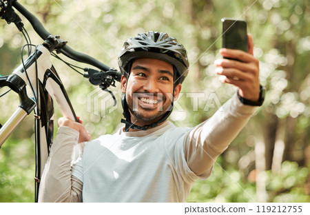 Man, bicycle and forest for selfie, nature or smile for wellness, training or blog on adventure. Influencer guy, cycling and mountain bike for profile picture, memory or live stream on social network 119212755