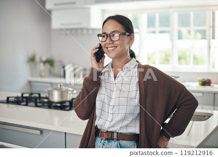 Asian, happy woman or phone call in home talking or speaking in kitchen for communication. Chat, mobile or Japanese female person with smile in conversation to relax in a house or apartment on break 119212916