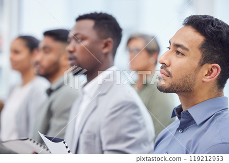 Business man, group and listening to seminar, presentation and salesman at team training workshop. Meeting, audience and serious professional at conference with crowd at convention event for speech Business man, group and listening to seminar, presentation and salesman at team training workshop. Meeting, audience and serious professional at conference with crowd at convention event for speech 119212953