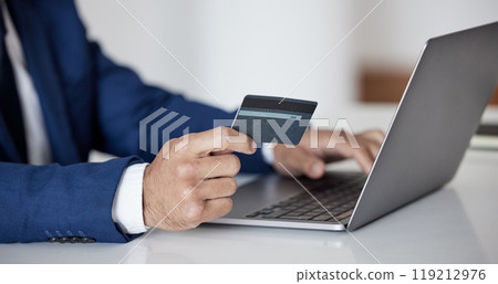 Credit card, hands and business man at laptop for fintech, accounting investment or savings budget. Closeup of trader, investor and computer for online shopping, ecommerce banking or trading money Credit card, hands and business man at laptop for fintech, accounting investment or savings budget. Closeup of trader, investor and computer for online shopping, ecommerce banking or trading money 119212976