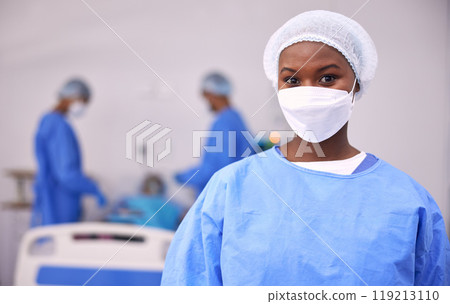 Portrait, woman and surgeon in operating room, hospital and surgery for medical emergency. Healthcare, african doctor and clinic expert in face mask, scrubs and ppe for working in operation theatre Portrait, woman and surgeon in operating room, hospital and surgery for medical emergency. Healthcare, african doctor and clinic expert in face mask, scrubs and ppe for working in operation theatre 119213110