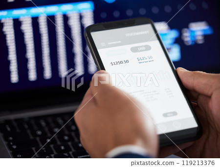 Hands, phone and man trading on stock market, fintech app or cryptocurrency savings. Closeup of financial trader, broker and screen of tech for data statistics, banking investment or stocks dashboard Hands, phone and man trading on stock market, fintech app or cryptocurrency savings. Closeup of financial trader, broker and screen of tech for data statistics, banking investment or stocks dashboard 119213376
