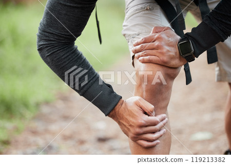 Knee pain, injury and person hand in park with fitness, workout and training accident from hike. Runner, leg massage and fail from trekking in the woods on a trail with muscle strain and emergency 119213382