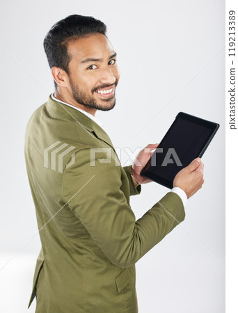 Smile, tablet and portrait of businessman with technology with internet isolated in a studio white background. Online, planning and young person or employee working on connection or networking Smile, tablet and portrait of businessman with technology with internet isolated in a studio white background. Online, planning and young person or employee working on connection or networking 119213389