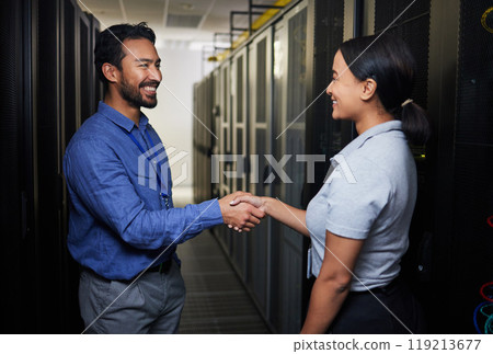 Handshake, partnership or happy people in server room of data center for network help with IT support. B2b deal agreement, teamwork or engineers shaking hands together in collaboration for solution 119213677