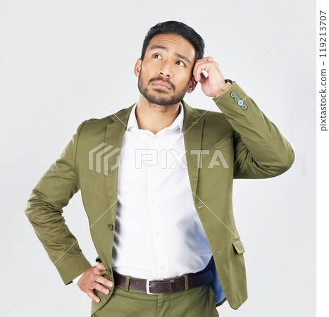 Business man, thinking and vision in studio with ideas, confused and questions by white background. Indian entrepreneur, brainstorming and remember for decision, choice and problem solving in career Business man, thinking and vision in studio with ideas, confused and questions by white background. Indian entrepreneur, brainstorming and remember for decision, choice and problem solving in career 119213707