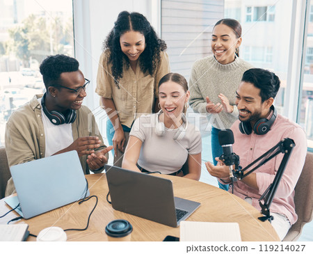 Talk show, applause and team with celebration, laptop and happiness with prize, award and cooperation. People, presenter and group with achievement, clapping and live streaming with a pc and podcast 119214027